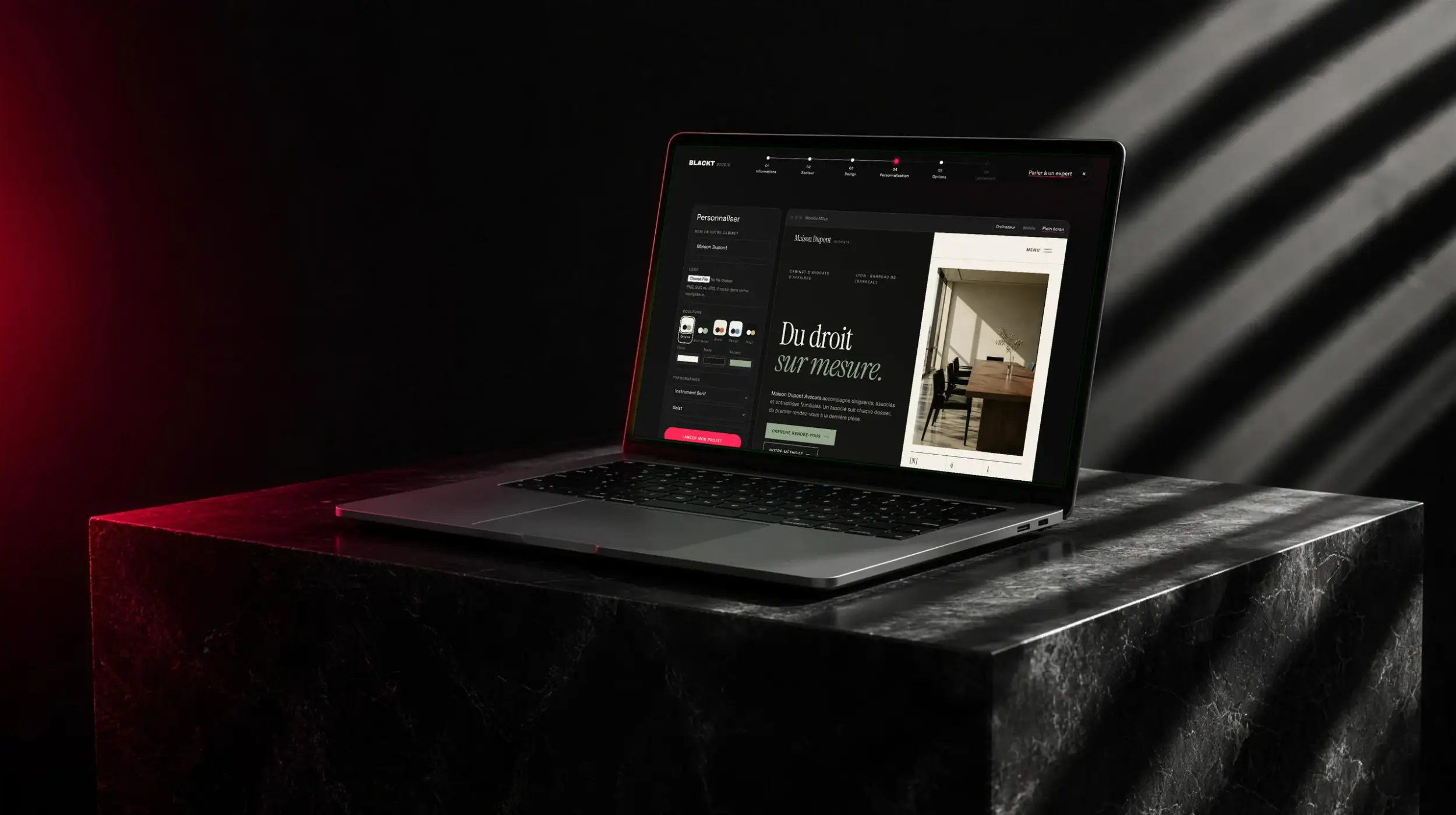 Le parcours BLACKT Studio sur un MacBook : personnalisation en direct d'un site de cabinet d'avocats (nom, couleurs, typographies)